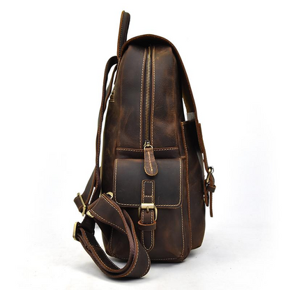 Handcrafted leather Freja Backpack by Start2Finish, featuring adjustable straps and a spacious main compartment in rich brown leather.