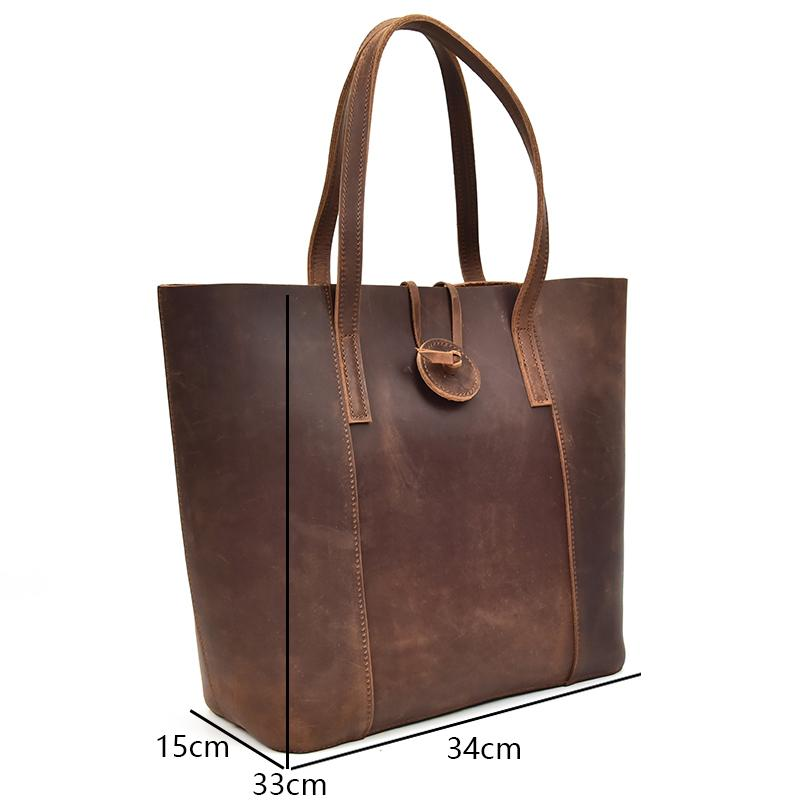 Handcrafted leather tote bag from Start2Finish, featuring a spacious accessories tote with sturdy handles and natural leather finish.