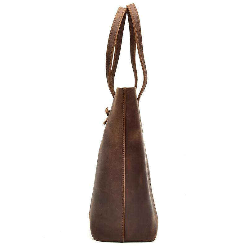 Handcrafted leather tote bag with sturdy handles and spacious interior, stylish accessories by Start2Finish.