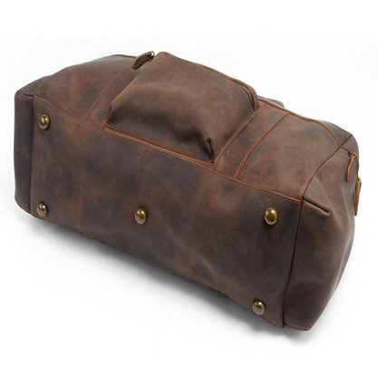 Handcrafted leather Asta Weekender duffle bag from Start2Finish, showing its spacious design and sturdy leather handles.