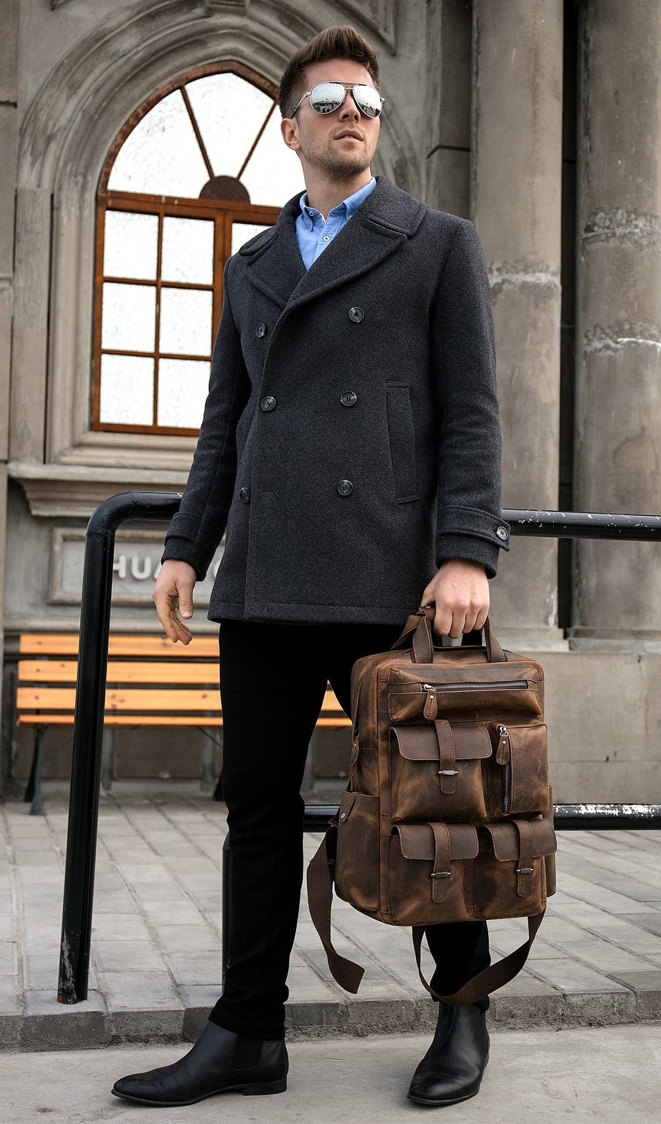 Handmade genuine leather Shelby backpack with adjustable straps and top handle, featuring a sleek, classic design for accessories.