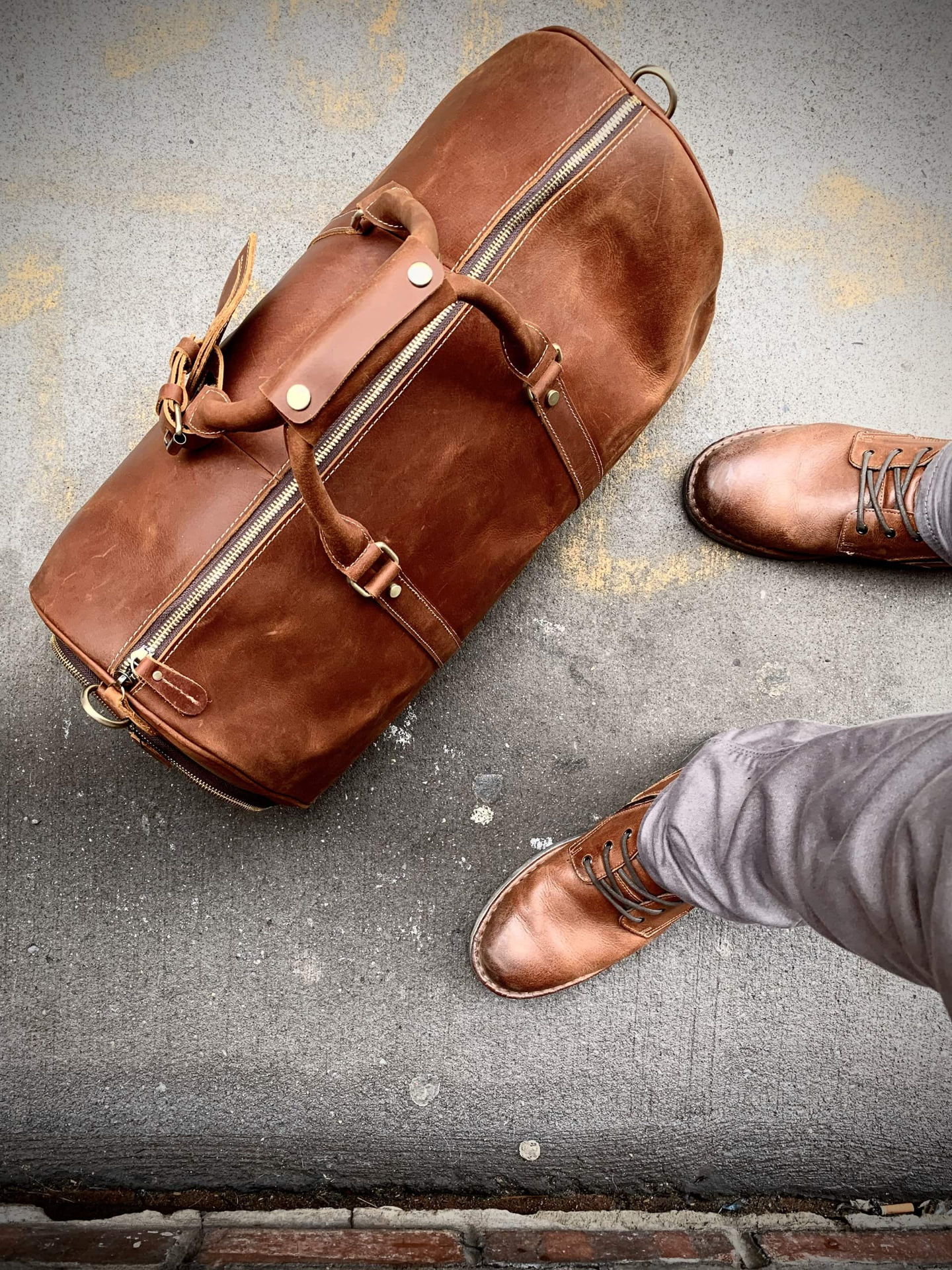 Start2Finish Dagny Weekender large leather duffle bag with handles and zipper closure, showcasing its spacious design and premium leather.