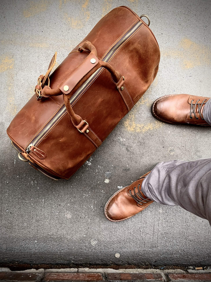 Start2Finish Dagny Weekender large leather duffle bag with handles and zipper closure, showcasing its spacious design and premium leather.