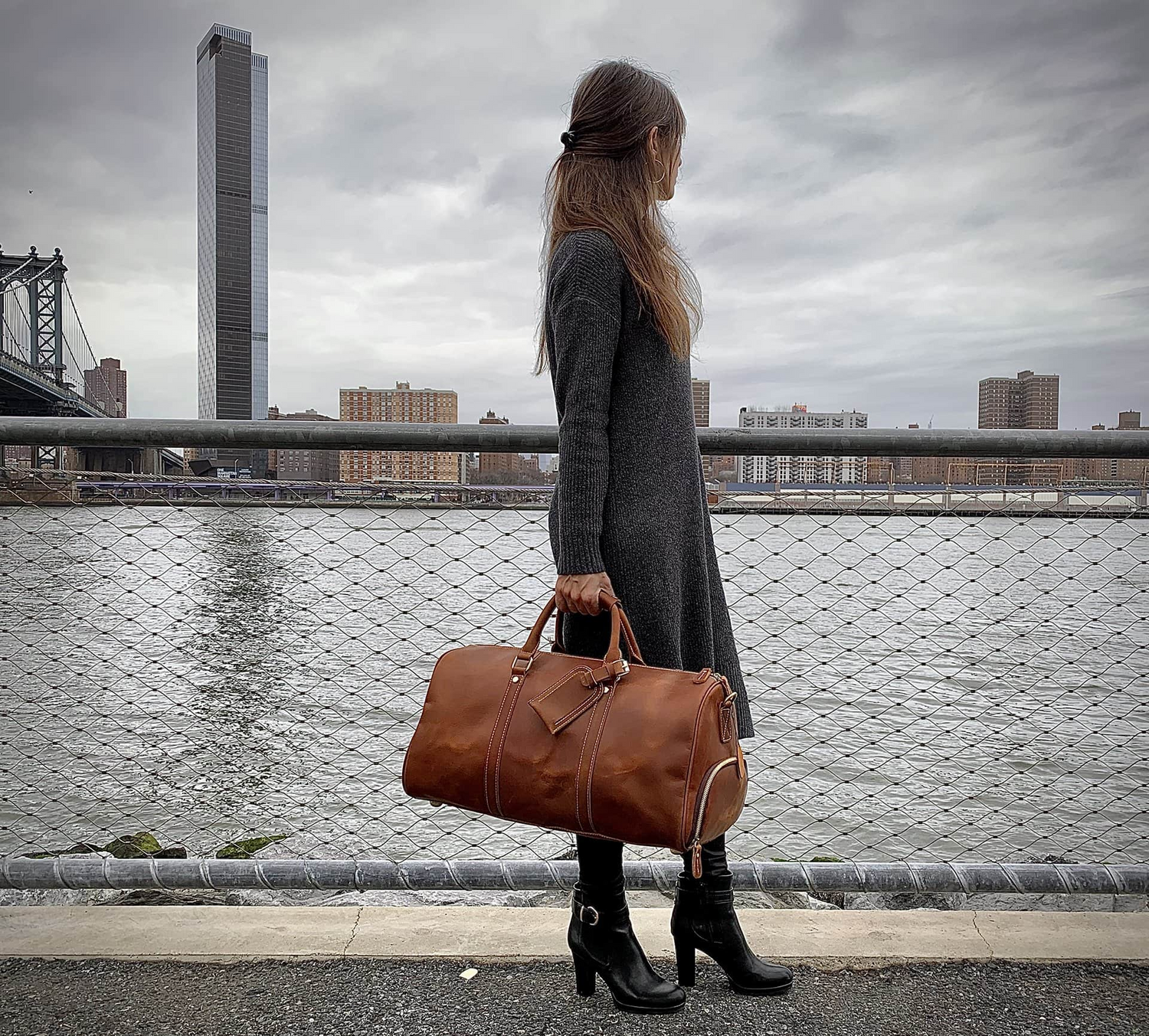 Large leather duffle bag from Start2Finish Dagny Weekender with sturdy handles and spacious interior for travel accessories.