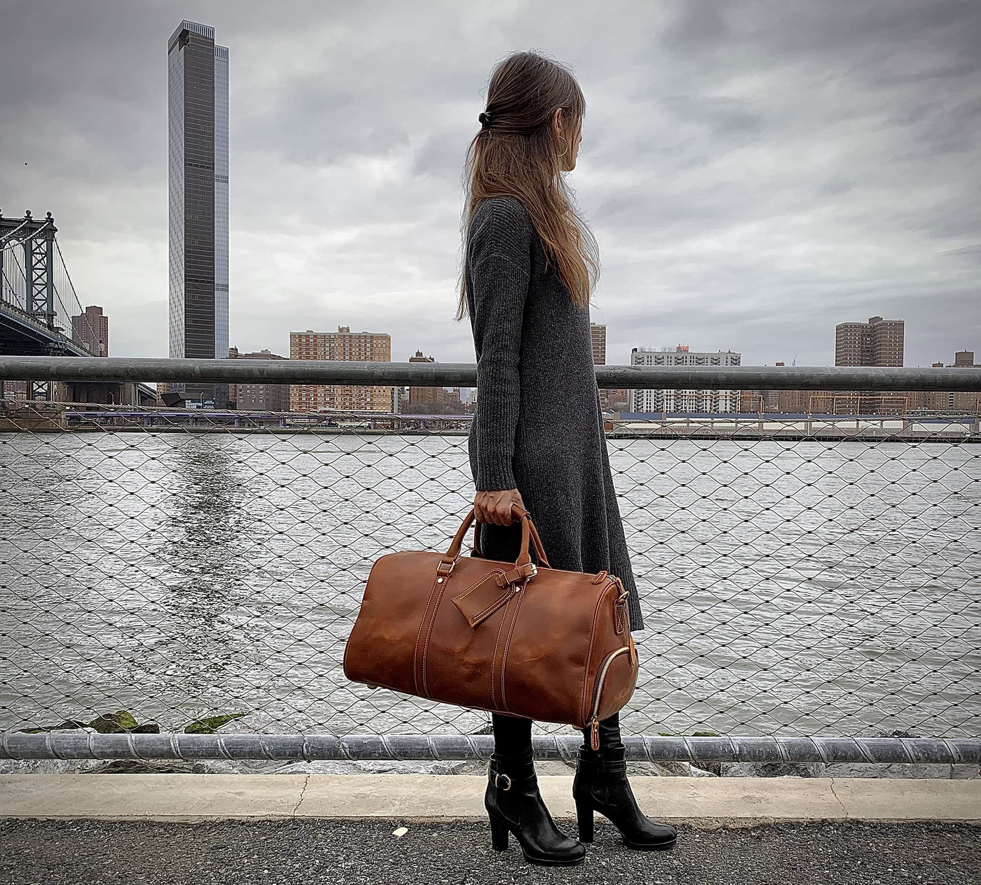 Large leather duffle bag from Start2Finish Dagny Weekender with sturdy handles and spacious interior for travel accessories.