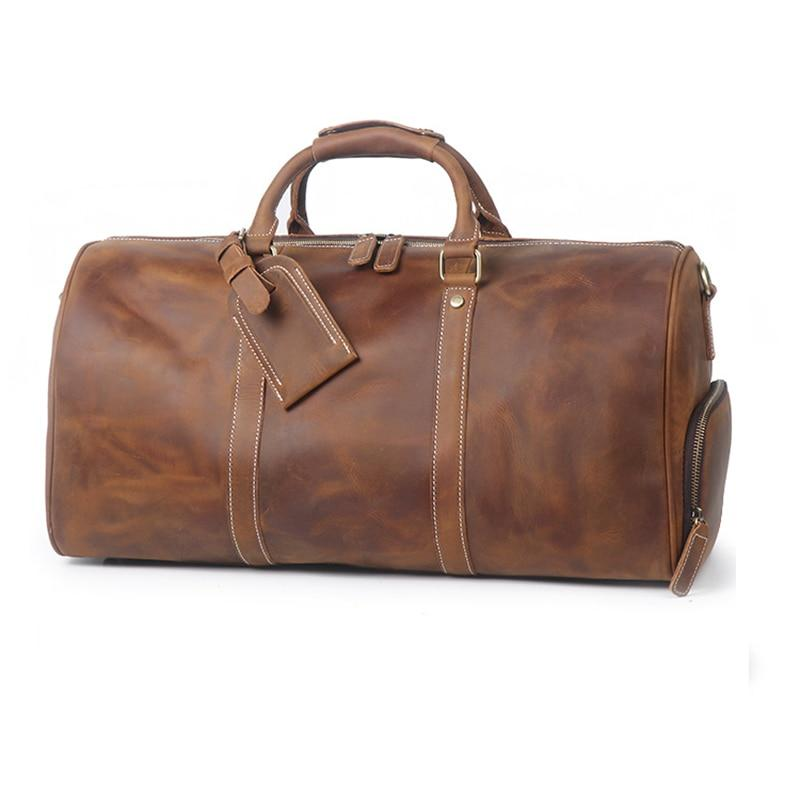 Large leather duffle bag from Start2Finish Dagny Weekender, showing its spacious design and sturdy leather construction.