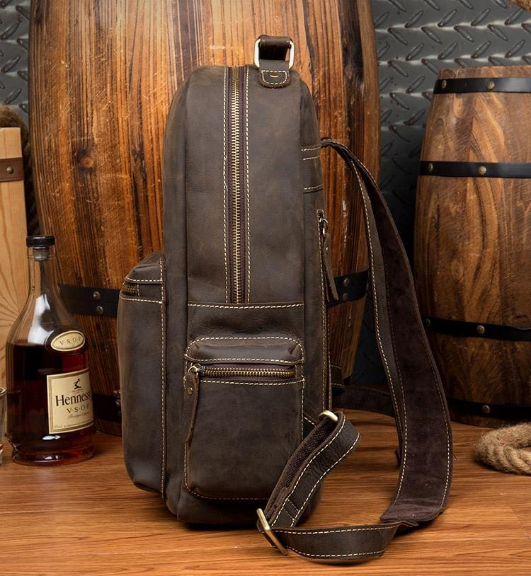 Start2Finish Langley Vintage Leather Backpack showing rugged genuine leather with adjustable straps and multiple compartments.