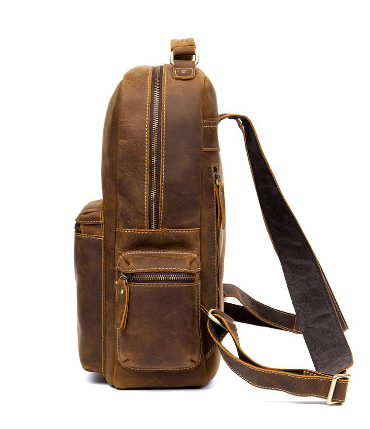 Start2Finish The Langley backpack in genuine vintage leather with adjustable straps and classic design, side pockets, and top handle.