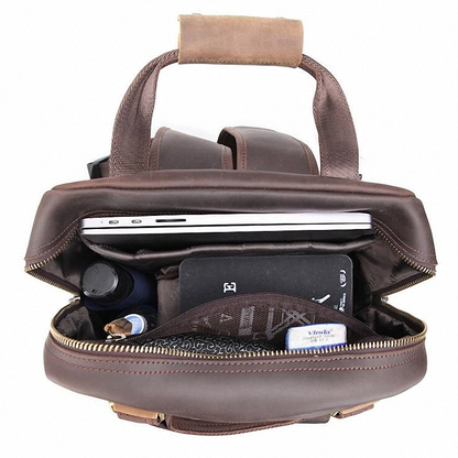 Large leather backpack camera bag with tripod holder from Start2Finish, featuring multiple compartments and adjustable straps.
