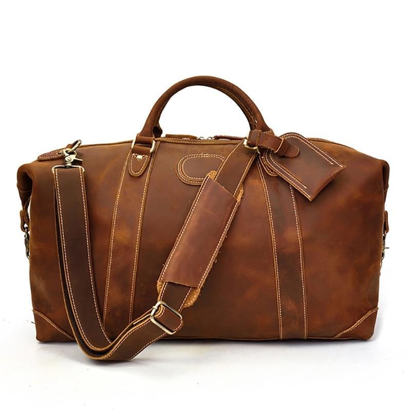 Start2Finish Eira Duffle Bag with vintage leather finish, showcasing textured leather and sturdy handles for weekend travel accessories.