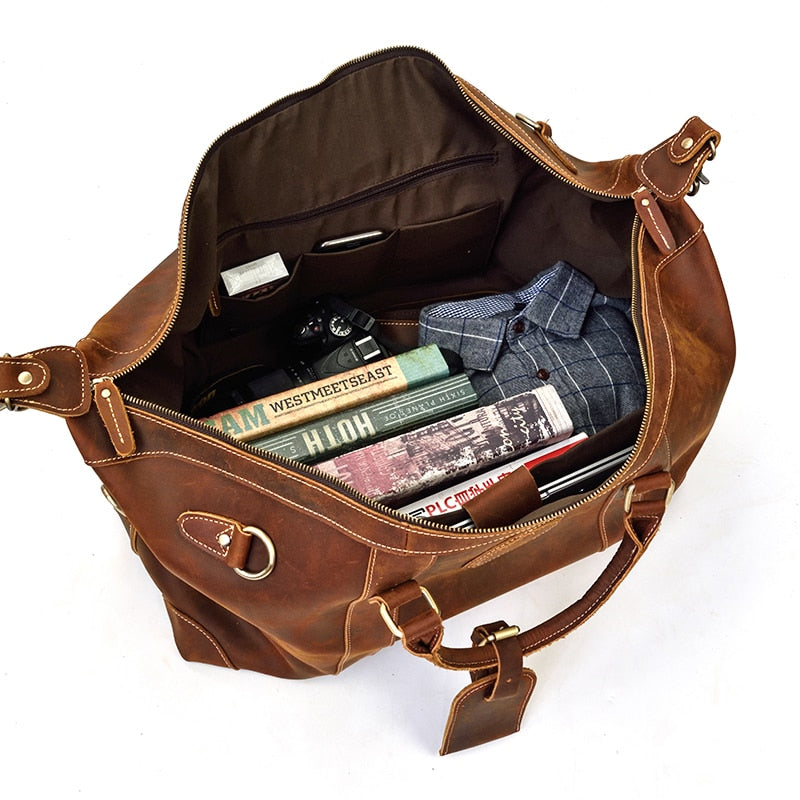 Start2Finish Eira Duffle Bag, vintage leather weekender bag with sturdy handles and spacious interior for travel accessories.