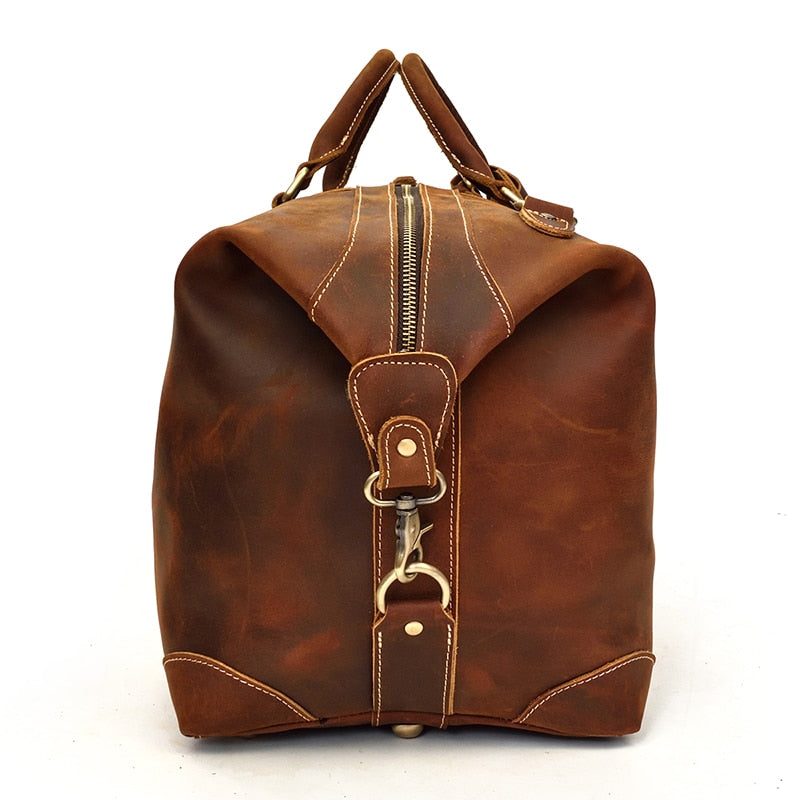 Start2Finish Eira Duffle Bag in vintage leather, featuring sturdy handles and spacious design for weekend accessories.