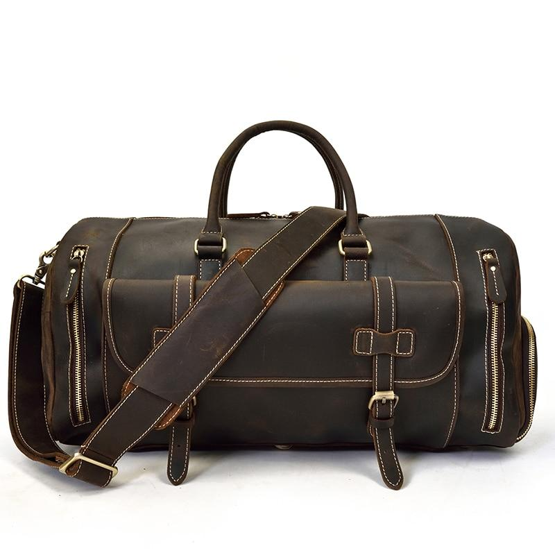 Handmade leather duffle bag from Start2Finish The Bard Weekender, with sturdy handles and spacious design for travel accessories.