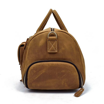 Handmade leather duffle bag from Start2Finish The Bard Weekender, featuring durable leather and spacious accessory design.