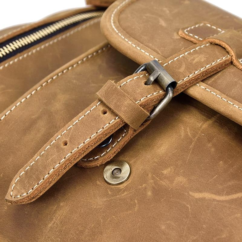 Handmade leather duffle bag from Start2Finish, The Bard Weekender, with sturdy handles and spacious interior for travel accessories.