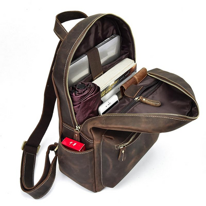 Handcrafted leather Calder Backpack by Start2Finish, featuring a sleek design with adjustable straps and multiple compartments.