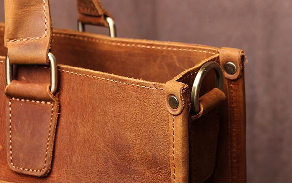 Start2Finish Dagmar leather briefcase with vintage finish, features sturdy handle and secure flap closure, perfect for professional accessories.