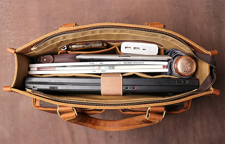 Start2Finish Dagmar leather briefcase with vintage brown leather finish, featuring sturdy handles and a spacious main compartment.