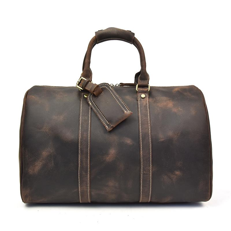 Start2Finish Brandt Weekender small leather duffle bag with handles and zipper closure, stylish accessories for travel and weekend trips.