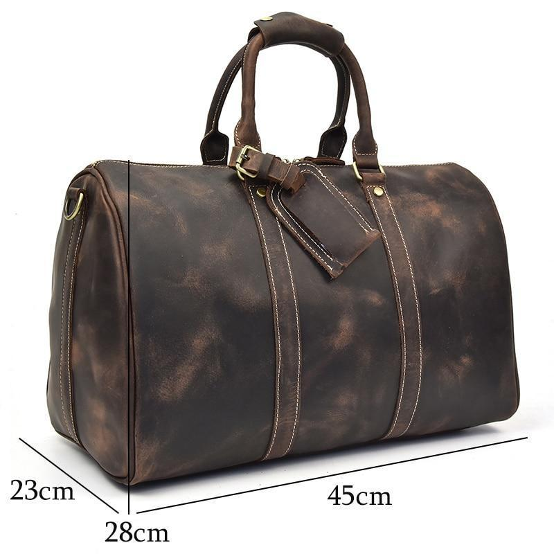 Start2Finish Brandt Weekender small leather duffle bag with sturdy handles and sleek design, perfect for travel accessories.