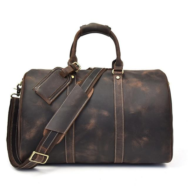 Start2Finish Brandt Weekender small leather duffle bag with top handles and zipper closure, showing its compact design.