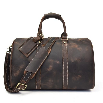Start2Finish Brandt Weekender small leather duffle bag with top handles and zipper closure, showing its compact design.