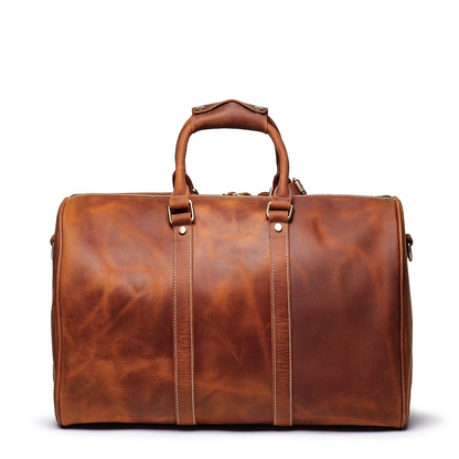 Start2Finish Brandt Weekender small leather duffle bag with handles, zipper closure, and side pocket for travel accessories.
