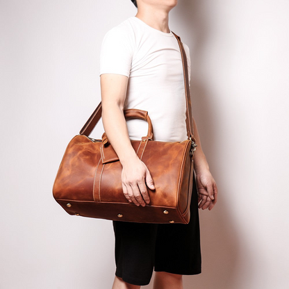 Small leather duffle bag from Start2Finish&