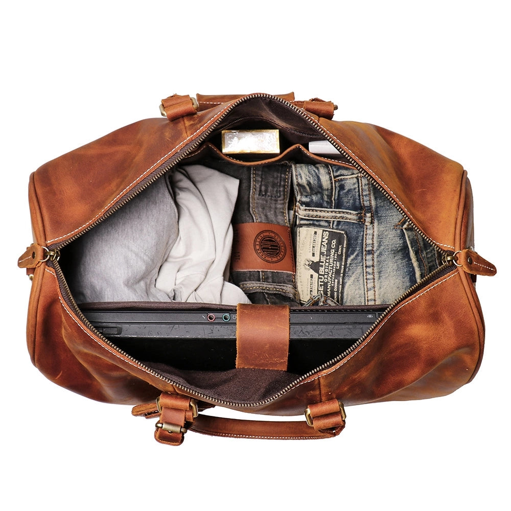 Start2Finish Brandt Weekender small leather duffle bag with handles and zipper closure, showing its compact, stylish design.