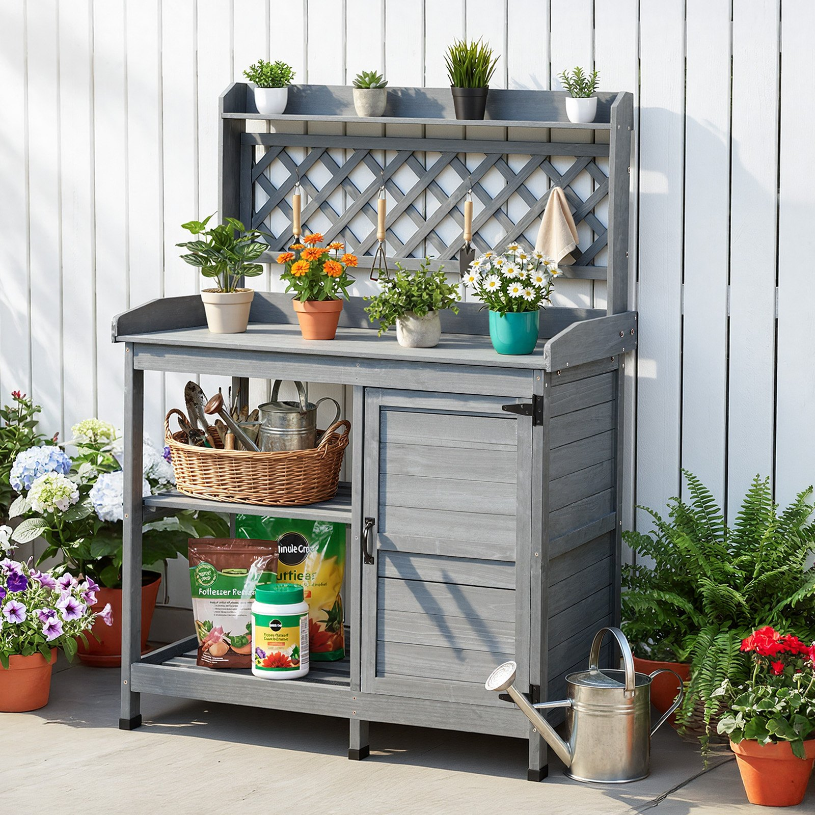 Start2Finish VEVOR outdoor gardening potting bench with wooden tabletop, storage cabinet, and shelves for patio or backyard gardening.
