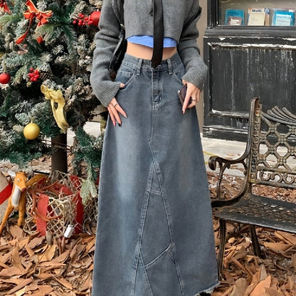 High-waisted skinny denim skirt for girls by Carmine Juneberry, featuring a fitted silhouette and classic blue denim fabric.