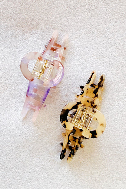 Fuchsia Hercules Barely There Hair Claw jewelry accessory shown in a close-up image, highlighting its sleek design and metallic finish.