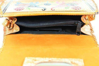 Silver Hestia Lucky Elephants clutch purse with embossed elephant design, compact and stylish for everyday or special occasions.