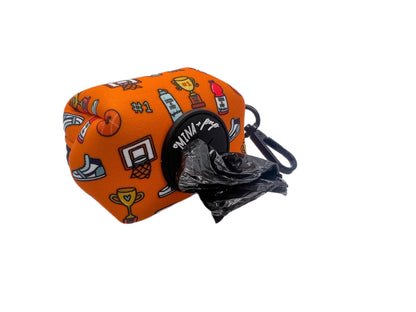 Carmine Phanes Got Game? basketball-themed poop bag holder attached to a leash for pet walks.