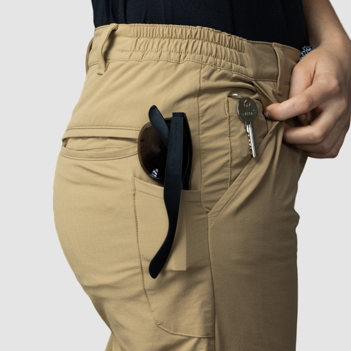 Women’s beige adventure pants by Rose Hemera, activewear with a comfortable fit and stylish design, suitable for outdoor activities.