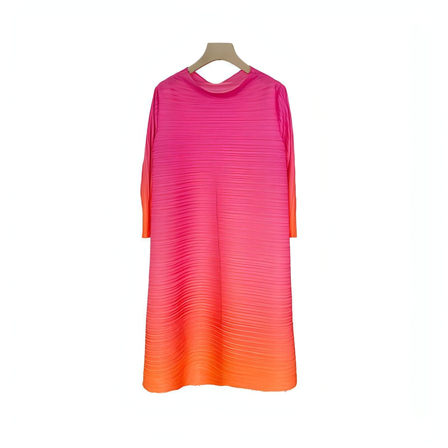 Plus size pleated dress for women by Carmine Juneberry, featuring a flowing design and elegant style.