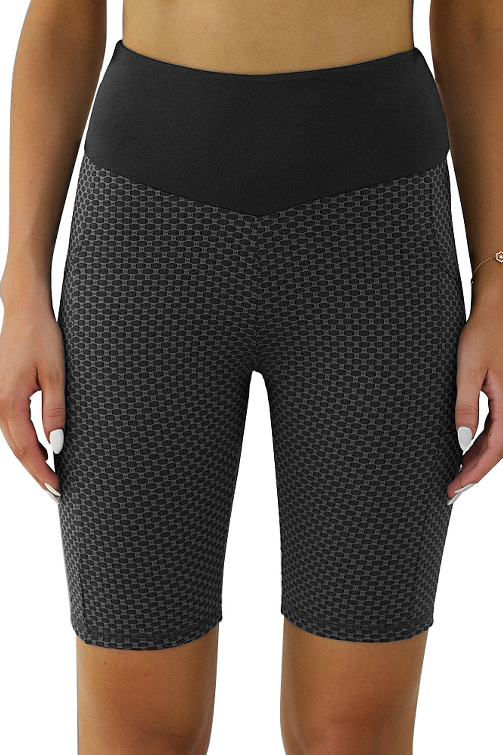 Harlequin Daisy black yoga shorts with side pockets, ruched design, and sculpting fit for active and casual wear.