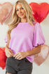 Carmine Juneberry Phalaenopsis textured O-neck puff sleeve blouse, stylish tops and blouses, front view with textured fabric.