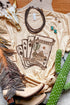 Carmine Juneberry Khaki Western Poker Cards graphic T-shirt featuring poker chip and card designs on a casual cotton T-shirt.