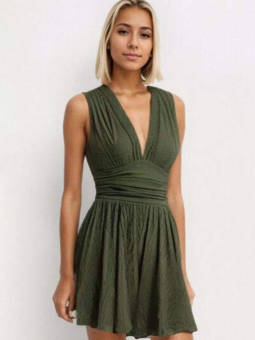 Taupe Oliver MUNSIEUR ruched plunge romper, sleeveless luxury jumpsuit for women, shown with fitted waist and stylish design.