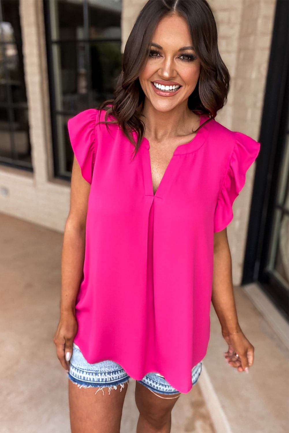 Rose red notched neck ruffle sleeve blouse from Carmine Juneberry, stylish tops and blouses with feminine ruffle details.