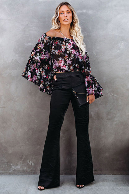 Black satin flare tailored pants by Harlequin Daisy, perfect for elegant bath and beauty lounge wear.