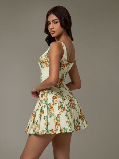 Taupe Oliver floral sleeveless mini pleated dress, casual T-shirt style with vibrant floral pattern and lightweight fabric.