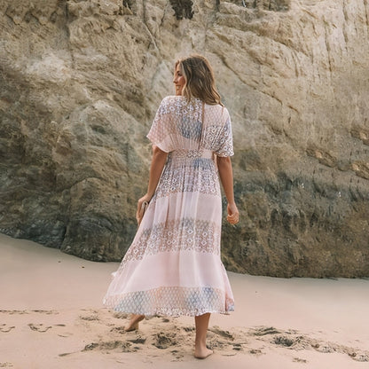 Women’s spring printed dress by Carmine Juneberry, featuring vibrant floral design and lightweight fabric for stylish comfort.