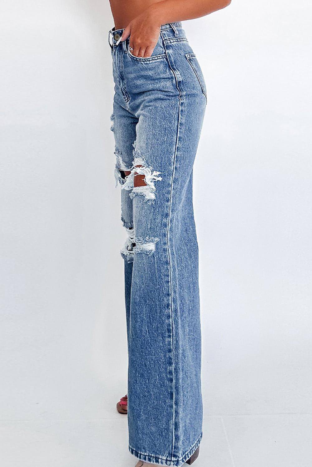 Carmine Juneberry Ashleigh Blue acid wash distressed wide-leg high-waist jeans on a model.