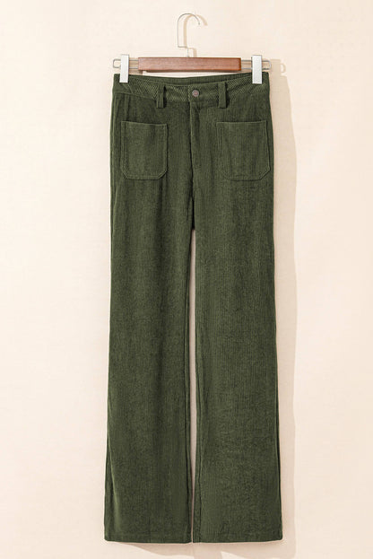 Green high waist corduroy pants with square pockets by Carmine Juneberry, featuring a stylish fit and textured fabric.