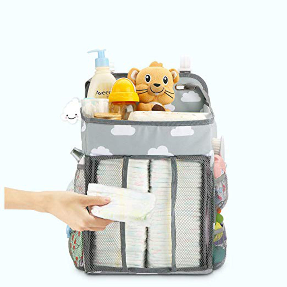 Maroon Asteria portable baby crib organizer bed hanging bag with multiple pockets for baby essentials.