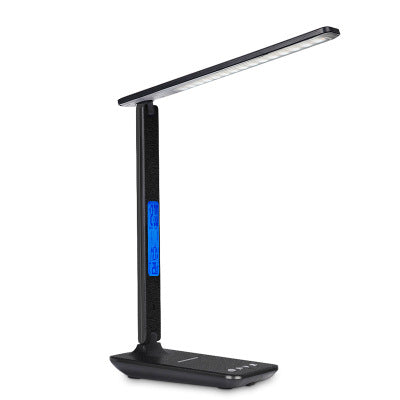 Salmon Lucky 3-in-1 Lamp with phone charger, clock, and thermostat, modern tech accessory with a sleek design.