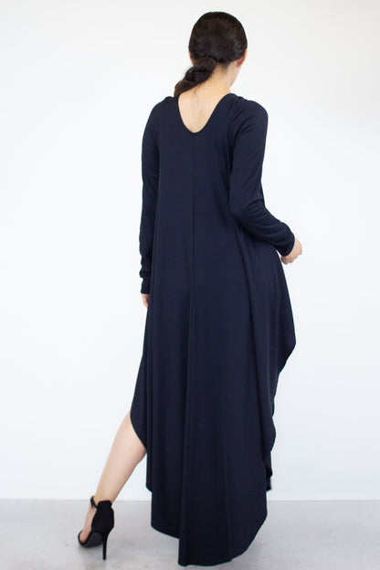 Yellow Hera asymmetric long sleeve maxi dress with flowing fabric and elegant design, suitable for formal or evening wear.