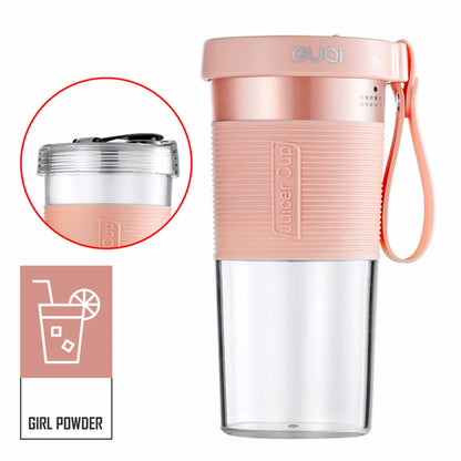 Maroon Asteria mini USB rechargeable portable electric fruit juicer on kitchen countertop with fresh fruits.